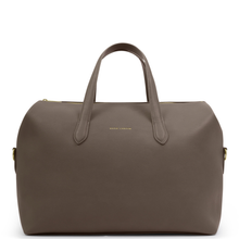 Brown leather bag with gold zipper on a white background