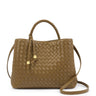 A woven leather handbag in a warm taupe-brown color, featuring a braided top handle, a matching leather drawstring with gold-tone hardware, and a long shoulder strap, photographed on a clean white background.