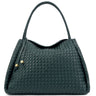A dark green woven leather handbag with a braided top handle and a small leather tassel detail with gold-tone hardware, shown against a plain white background.