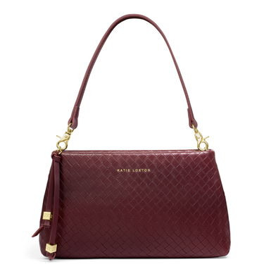 Maroon handbag with gold accents on a white background
