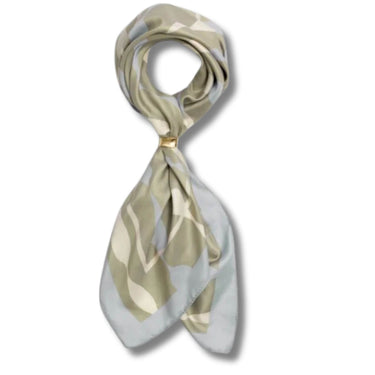 Neatly folded patterned scarf on a white background