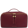 Maroon leather cosmetic bag with gold zipper and tassels on a white background