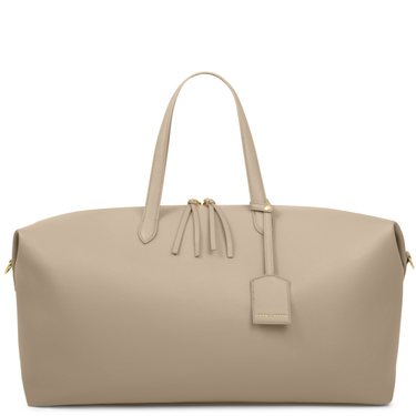 Beige handbag with a visible brand tag on a white background