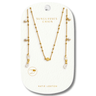 Gold necklace with pearls on a white card with 'Katie Loxton' branding.