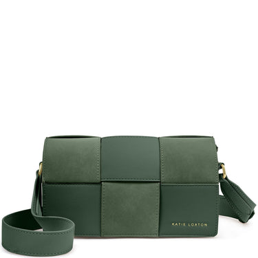 A dark green patchwork faux-leather crossbody bag by Katie Loxtun, featuring a wide adjustable strap and gold lettering on the front, set against a plain white background.
