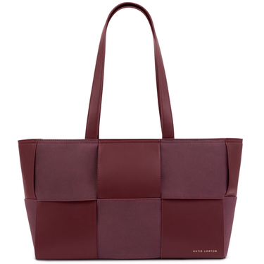 Maroon woven handbag on a white background