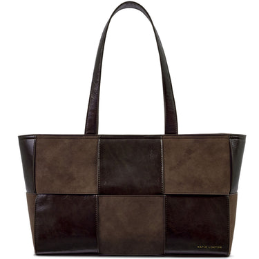 A patchwork leather tote bag by Kate Cotton in shades of brown, featuring a mix of smooth leather and suede-like panels, dual shoulder straps, and a small gold brand logo on the bottom right corner.