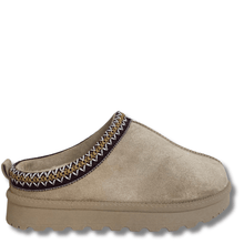 Beige slipper with decorative sole on a white background