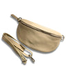 Beige leather waist bag with a strap on a white background