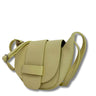 Green leather saddle bag on a white background
