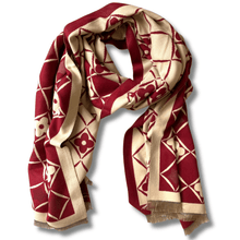 Red and beige patterned scarf on a white background
