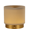 Textured beige lamp with gold base on a white background