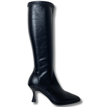 Black knee-high boot on a white background