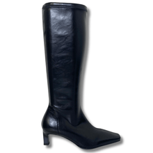 Black knee-high boot on a white background