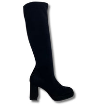 black suede over-the-knee boot with a chunky block heel and platform sole, shown from a side profile on a white background with a drop shadow.
