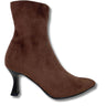 A brown suede ankle boot with a pointed toe and a black stiletto heel, shown from a side profile