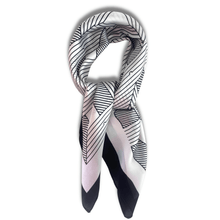 Black and white patterned scarf on a white background