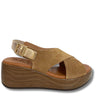 Brown wedge sandal with a gold buckle on a white background