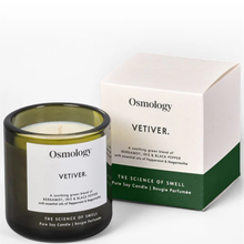 Osmology Vetiver candle and packaging on a white background