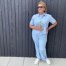Woman in light blue outfit 