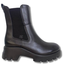A black leather Chelsea-style ankle boot with a chunky lug sole and a black elastic side gore featuring a small monogram logo.