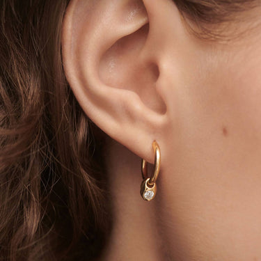 PDPAOLA Gold Delta Hoop Earrings