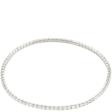 Silver bracelet with clear stones on a white background