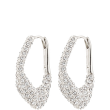 Silver hoop earrings with clear gemstones on a white background