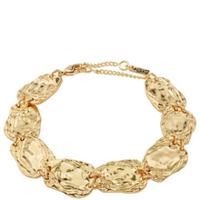 Gold bracelet with textured links on a white background