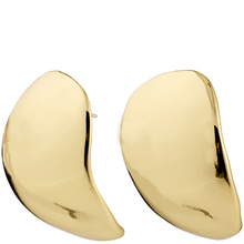 Gold earrings on a white background