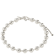Silver beaded bracelet on a white background