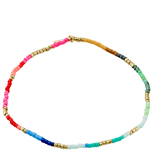 Colorful beaded necklace on a white background