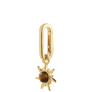Gold sun-shaped pendant with a brown gemstone on a white background