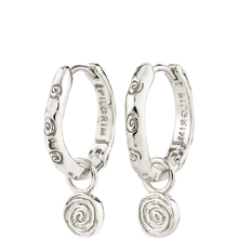 Pair of silver hoop earrings with spiral charms on a white background