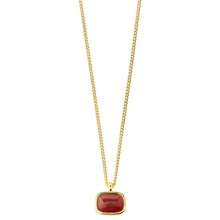 A gold chain necklace with a rounded rectangular red gemstone pendant, shown against a plain white background.