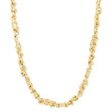 Gold chain necklace on a white background