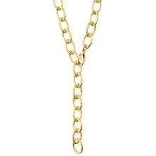 A close-up of a gold chain necklace with elongated oval links, shown against a plain white background.