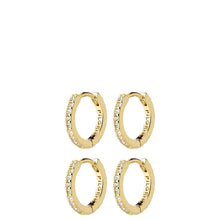 Four gold huggie hoop earrings, each adorned with a row of clear crystals on one side, arranged in a 2x2 grid on a solid white background. The brand name 'plkiern' is engraved on the inside of the hoops.