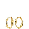A pair of gold huggie hoop earrings with a textured, organic wavy design, shown against a plain white background.