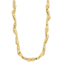 Gold necklace with wavy links on a white background