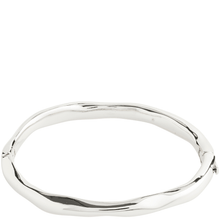 Silver bangle on a white background