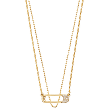 Gold necklace with a small pendant on a white background