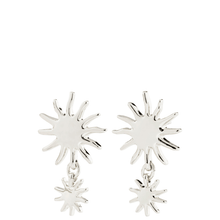 Silver star-shaped earrings on a white background