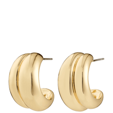 Gold hoop earrings on a white background