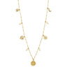 Gold necklace with various charms on a white background