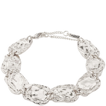 Silver chain bracelet on a white background