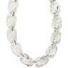 Silver bracelet with clear gemstones on a white background