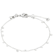 A delicate sterling silver chain anklet with small flat disc charms and a lobster clasp, displayed on a clean white background.