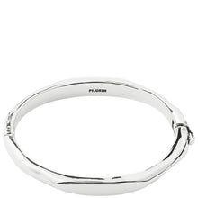 A polished silver-toned bangle bracelet with a textured, organic wavy edge and a small clasp on the side. The brand name 'PILGRIM' is engraved inside the band, shown against a plain white background.