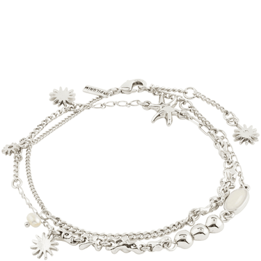 Silver bracelet with various charms on a white background